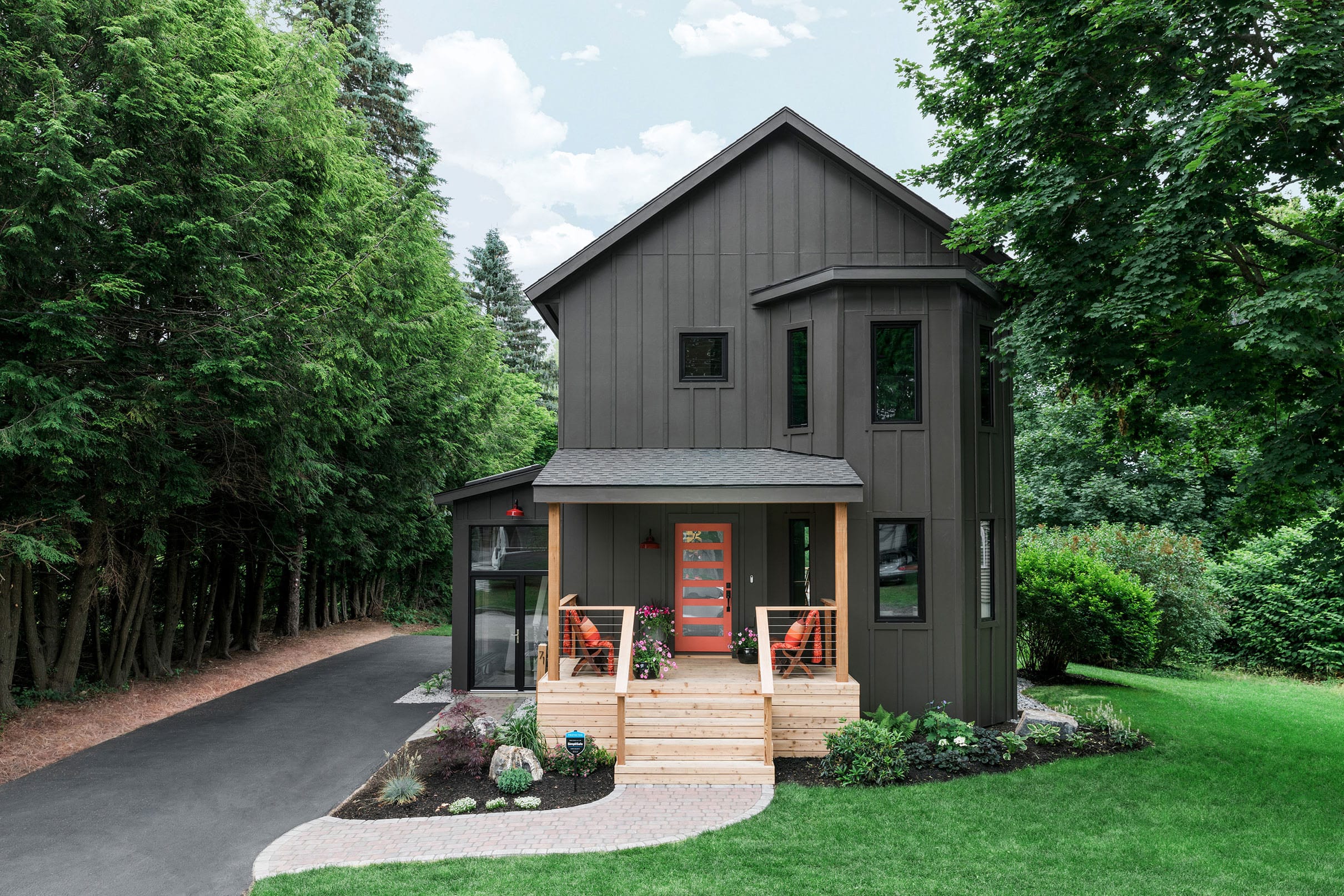 Grey house with colorful front porch small
