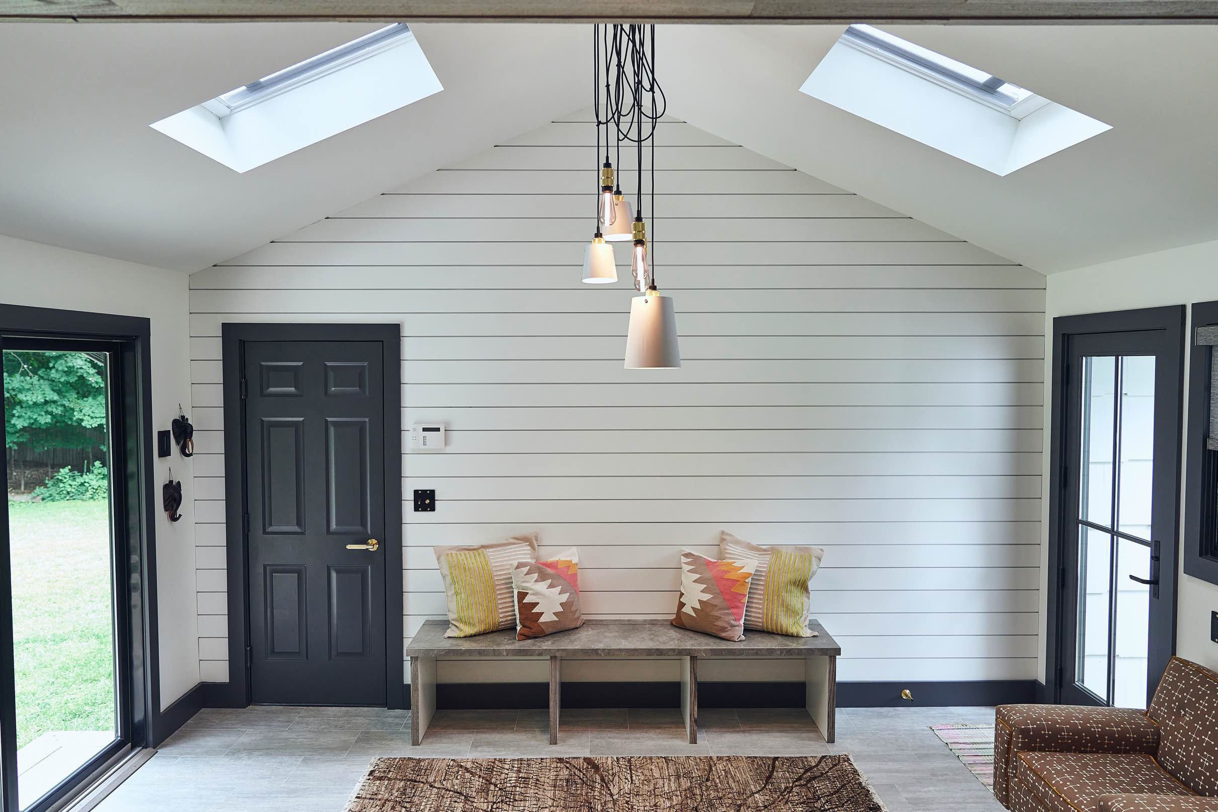 Sunroom with two skylights and shiplap tmb