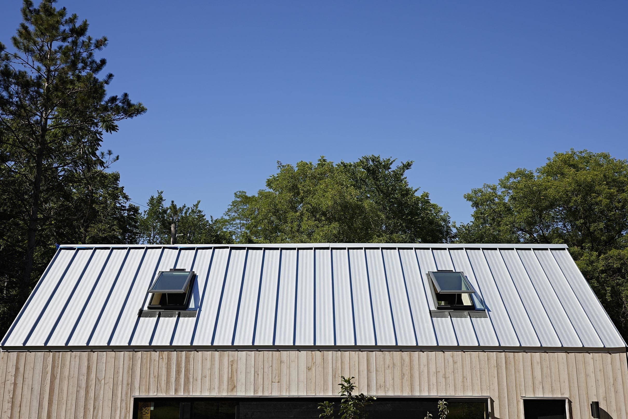 Two skylights on metal standing seam roof small