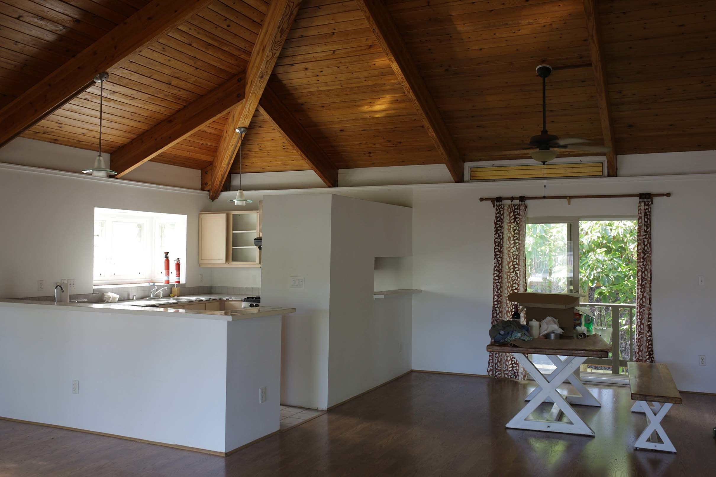 White kitchen wood ceiling dark