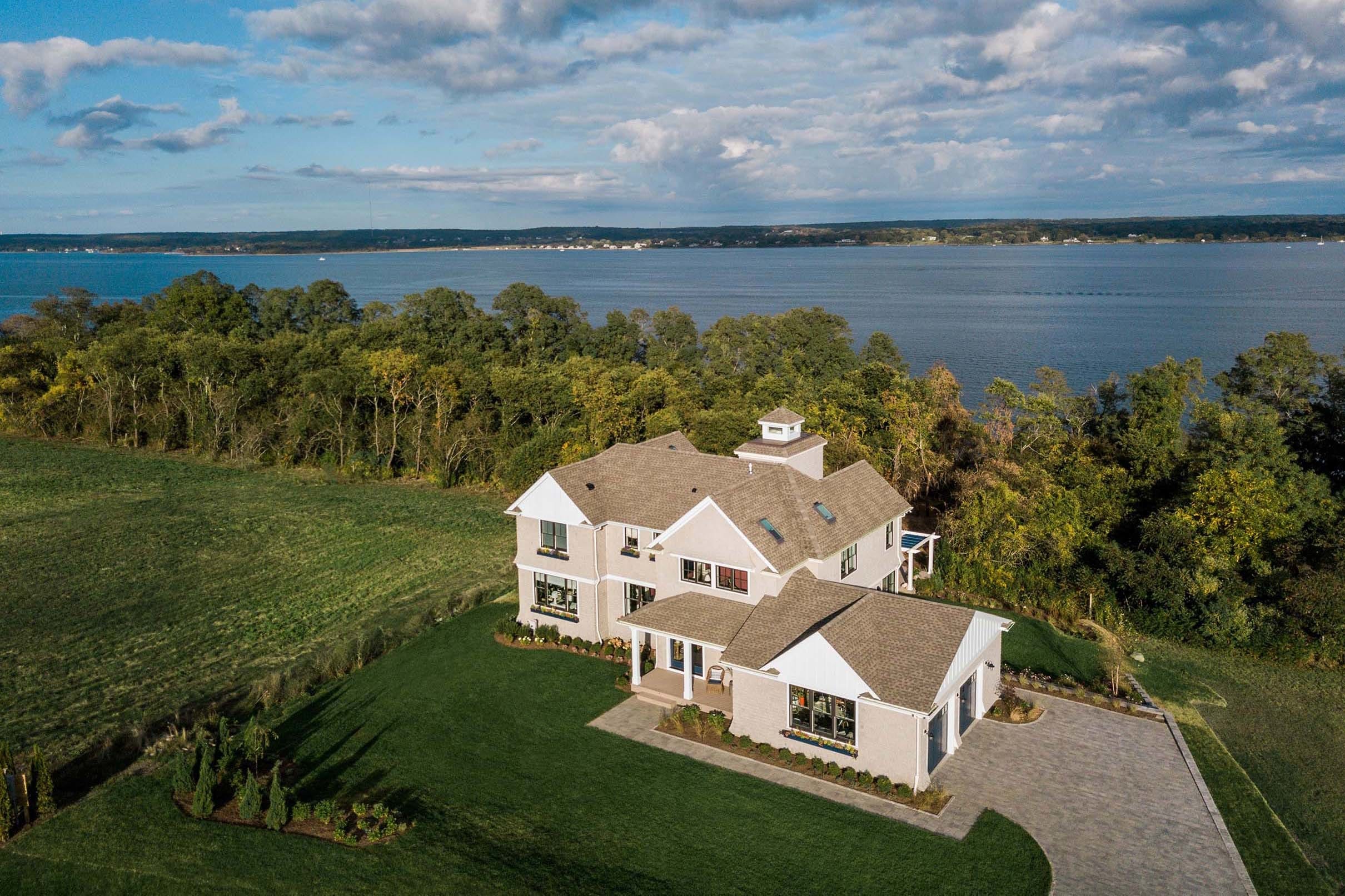 Aerial view of waterfront home small