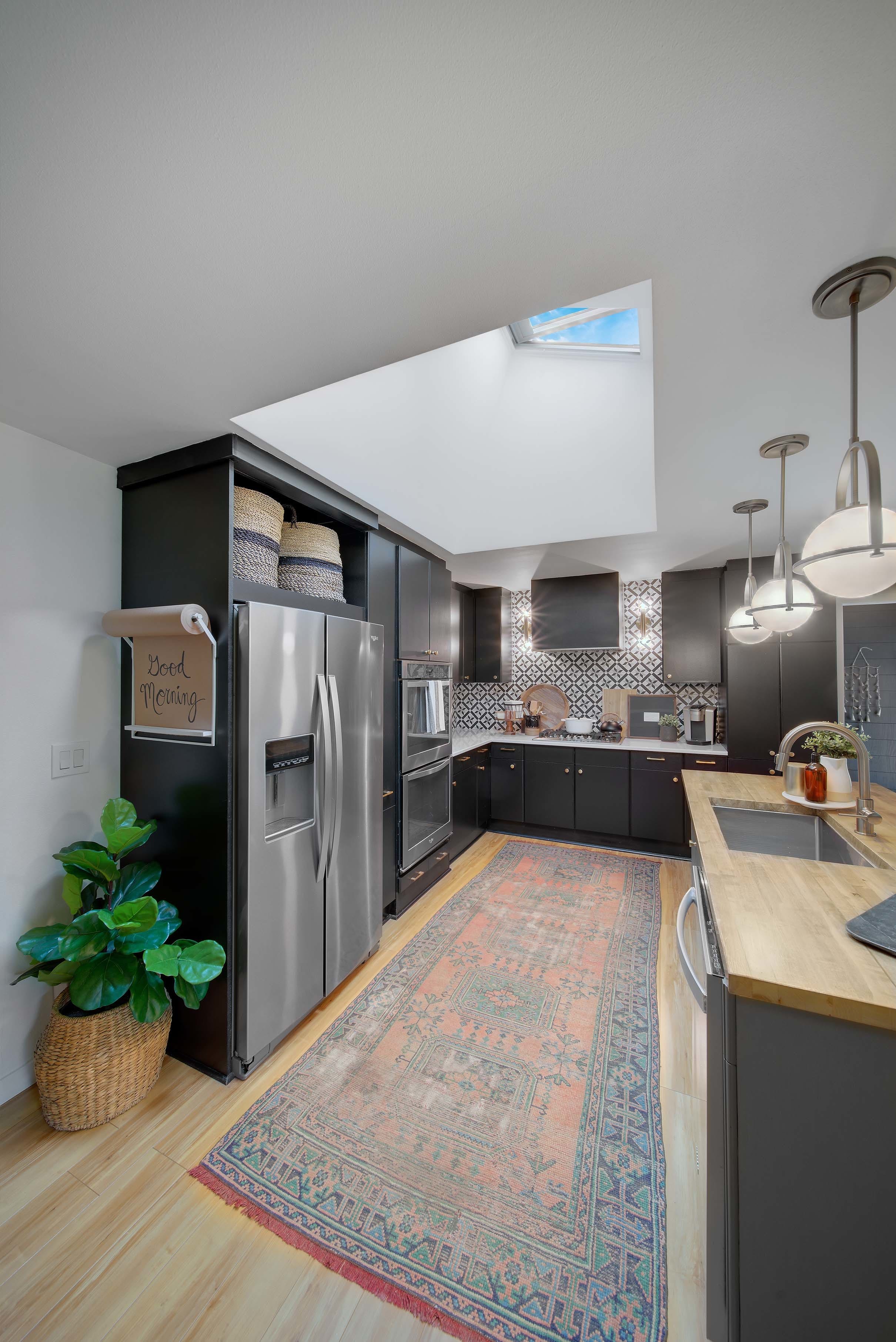 Kitchen skylights vintage rug black cabinets