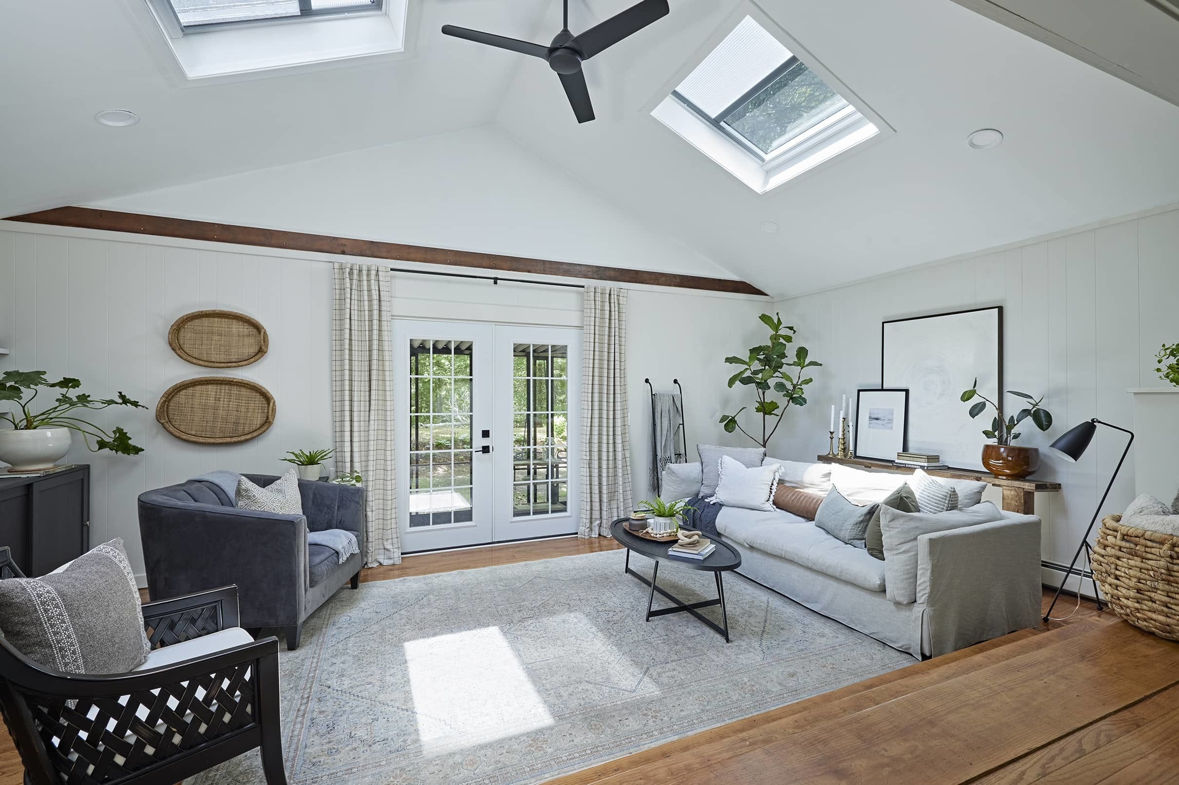 Living room skylights white grey plants