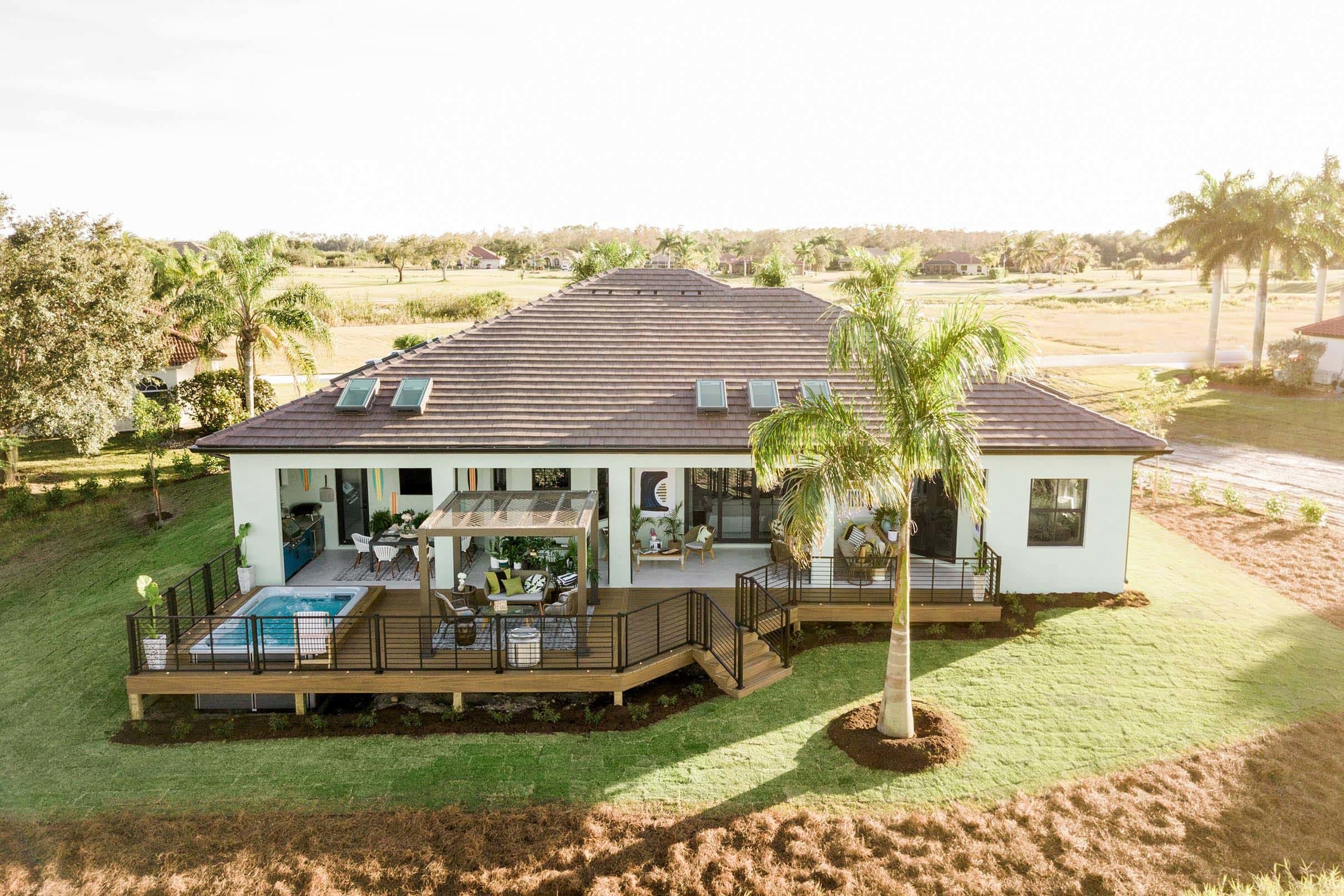 Ranch home back deck aerial view small
